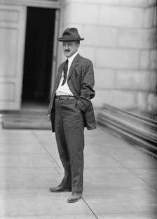 Monorail Subway, Capitol To Senate - Man Who Installed System, 1912. Creator: Harris & Ewing.