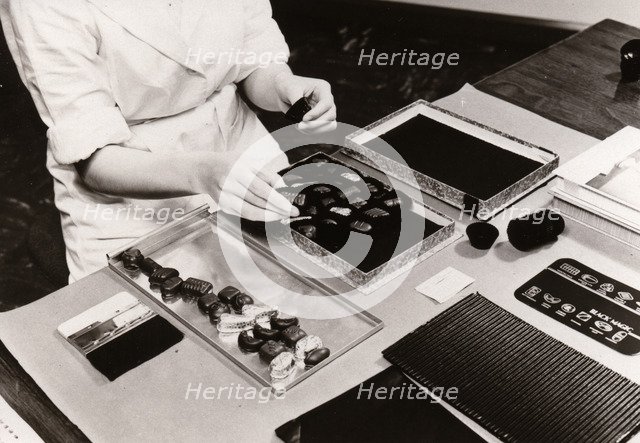 Packing Black Magic gift boxes, 1956. Artist: Unknown