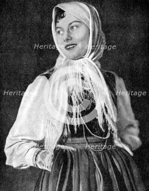 Polish woman in traditional dress, 1936. Artist: Unknown