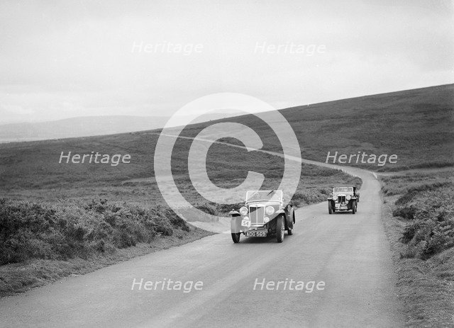 MG Magnette NAs of VM Roberts and FE Ainley at the MCC Torquay Rally, July 1937. Artist: Bill Brunell.