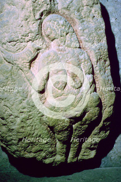 The Venus of Laussel, which may be interpreted as an earth-mother. Artist: Unknown