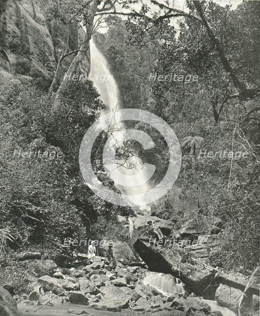 A waterfall near the village, Nuwara Eliya, Ceylon, 1895. Creator: W & S Ltd.