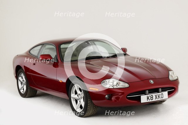 1999 Jaguar XK8 coupe Artist: Unknown.