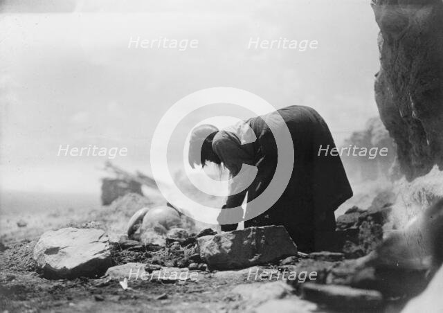 Potter building her kiln, c1906. Creator: Edward Sheriff Curtis.