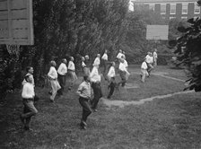 Camp, Walter, I.E, Exercise School - Cabinet Officials Exercising with Other Govt..., 1917 or 1918. Creator: Harris & Ewing.
