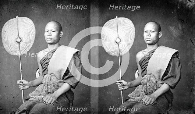 A Thai monk holding a fan, 1865. Creator: John Thomson.