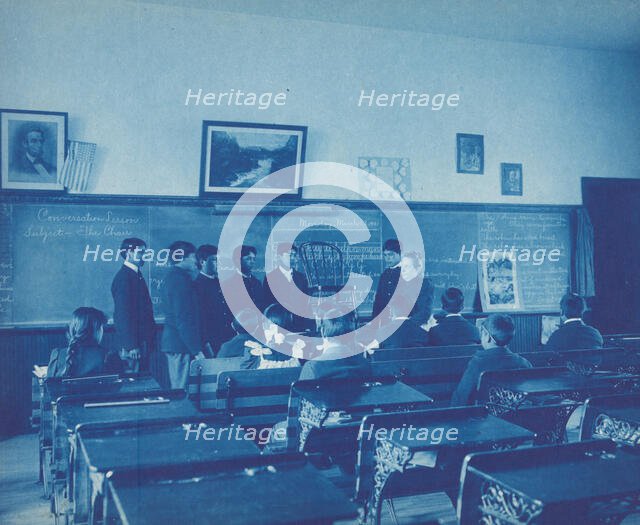 Conversation lesson, subject - the chair, 1901. Creator: Frances Benjamin Johnston.