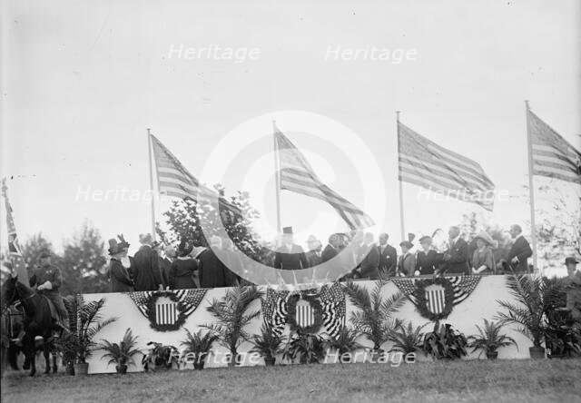 Cavalry Review By President Wilson - Seen In Stand: President Wilson; General Wood; Col..., 1913. Creator: Harris & Ewing.