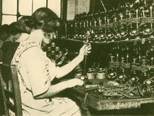 'Assembling the New Automatic Telephones Ready for Distribution to Subscribers', c1930. Creator: Unknown.