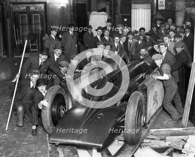 Golden Arrow with crowd of people after unpacking from crate 1929. Creator: Unknown.