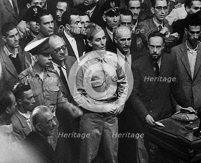 Two Soldiers at a Trial of Leading Fascists, 1944. Creator: British Pathe Ltd.