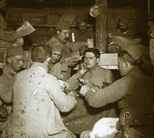 Soldiers playing Manille [card game] in the trenches, c1914-c1918. Artist: Unknown.