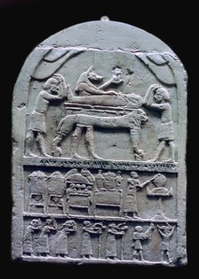 Egyptian stele showing Anubis preparing a mummy. Artist: Unknown