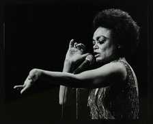 Eartha Kitt performing at the Forum Theatre, Hatfield, Hertfordshire, 20 March 1983. Her concert end Artist: Denis Williams