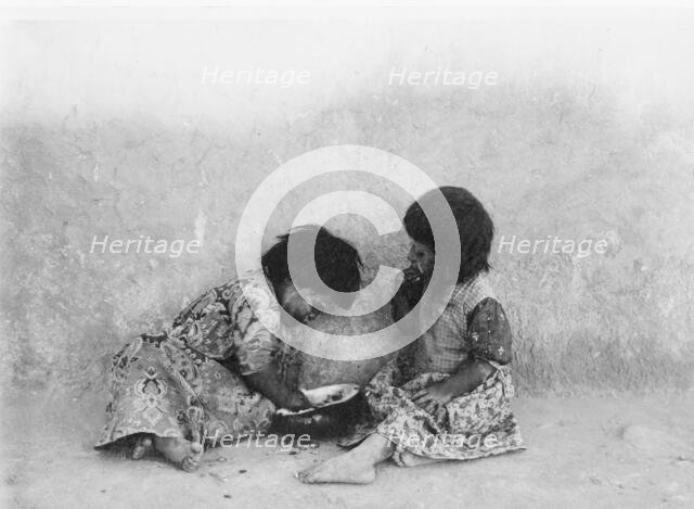 Moki melon eaters, c1900. Creator: Edward Sheriff Curtis.