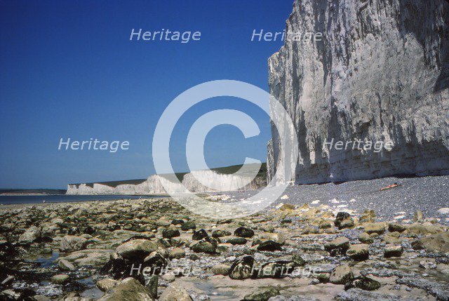 Chalk Cliffs and Beach, looking West, Birling Gap, Sussex, 20th century. Artist: CM Dixon.