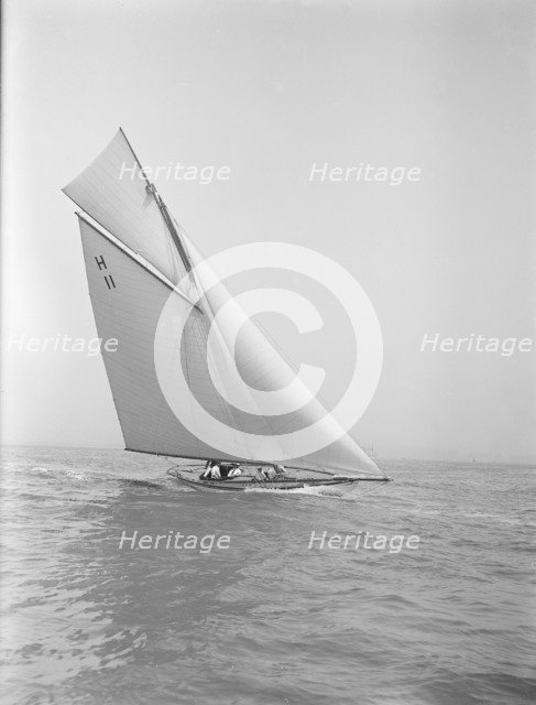 The 8 Metre 'Ventana' (H11) sailing close-hauled, 1912. Creator: Kirk & Sons of Cowes.