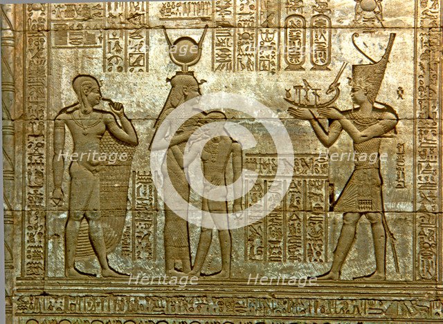 Reliefs with figures and writing in the Temple of Hathor.