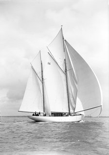 The 105 ft ketch 'Thendara' sailing with spinnaker. 1939. Creator: Kirk & Sons of Cowes.
