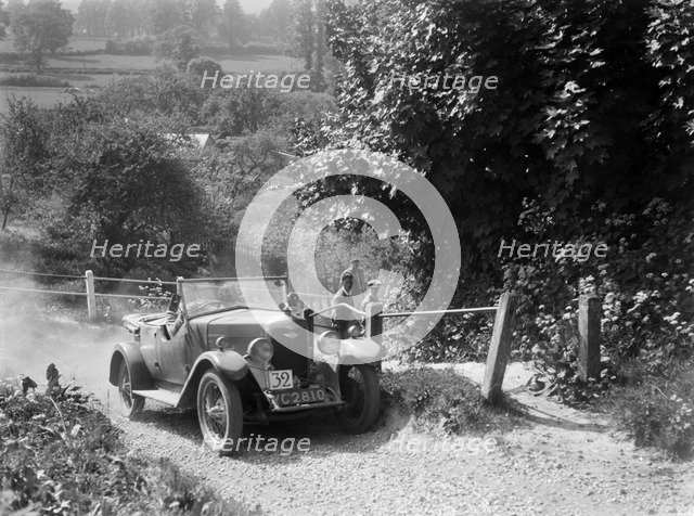Riley 4-seat tourer taking part in a West Hants Light Car Club Trial, Ibberton Hill, Dorset, 1930s. Artist: Bill Brunell.