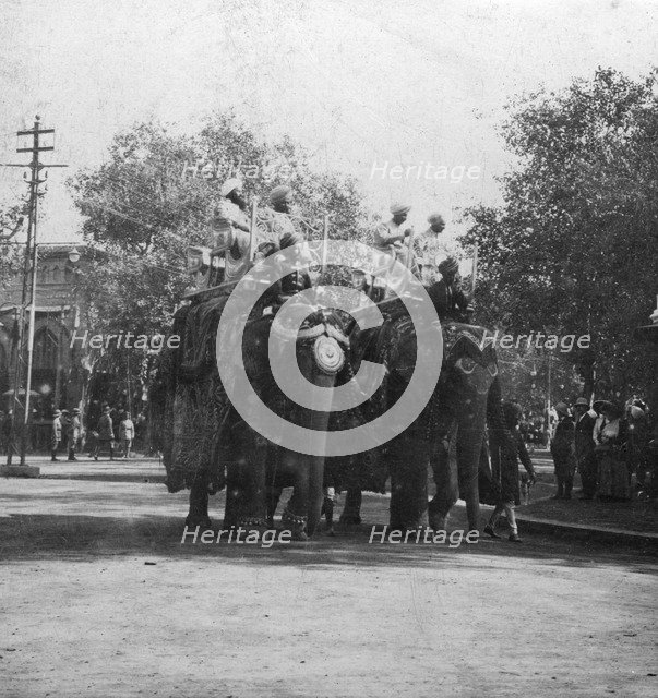 A Punjabi princess riding an elephant in a procession, Delhi, India, 1900s.Artist: H Hands & Son