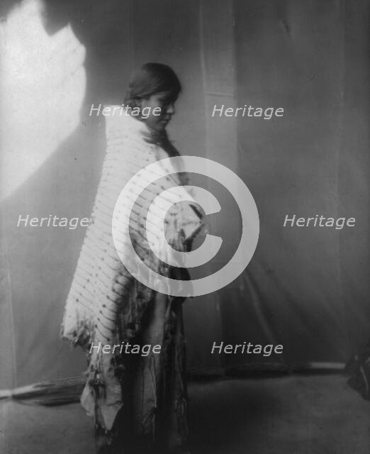 Atsina maiden, c1908. Creator: Edward Sheriff Curtis.