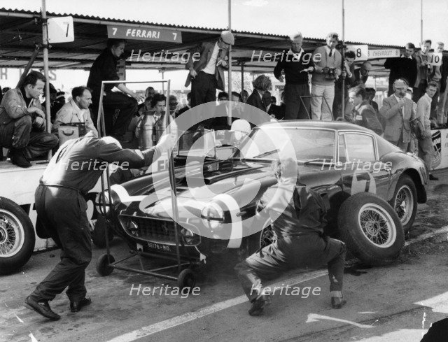 Stirling Moss in a Ferrari, Goodwood, 1961. Artist: Unknown