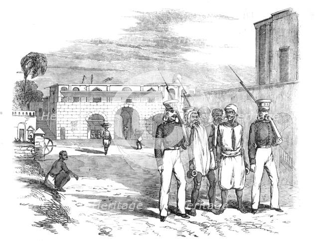Calcutta Gate and Main Guard, Fort William: Native Prisoners under Escort, 1857. Creator: Unknown.
