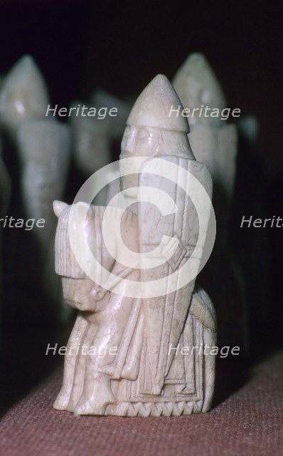 A Knight - The Lewis Chessmen, (Norwegian?), c1150-c1200. Artist: Unknown