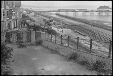 View looking south along the beach at Shanklin, showing Admiralty scaffolding, Isle Of Wight, 1945. Creator: George R Long.