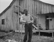 Cotton worker in Sunday clothes, near Blytheville, Arkansas, 1937. Creator: Dorothea Lange.
