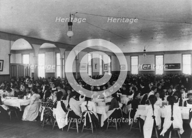 Students in dining hall, United States Indian School, Carlisle, Pa., 1901. Creator: Frances Benjamin Johnston.