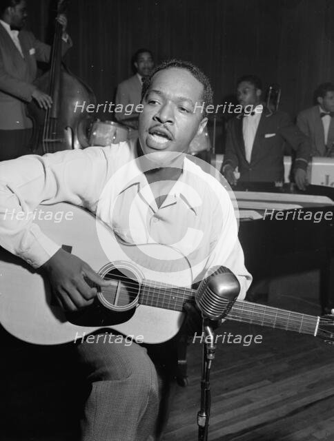Portrait of Josh White, Café Society (Downtown), New York, N.Y., ca. June 1946. Creator: William Paul Gottlieb.