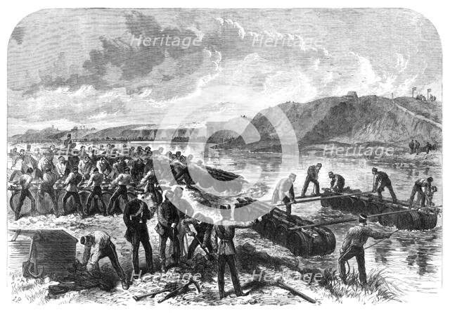 The Volunteer Review at Portsmouth: the 1st Hants Engineer Volunteers constructing a...bridge, 1868. Creator: Unknown.