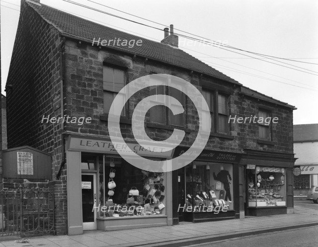 Shops in Bank Street, Mexborough, South Yorkshire, 1963.  Artist: Michael Walters