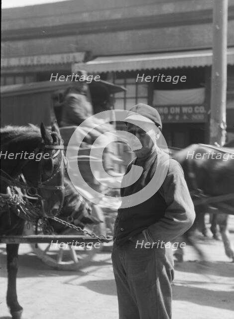 Street scene, possibly in Chinatown, San Francisco, between 1896 and 1942. Creator: Arnold Genthe.