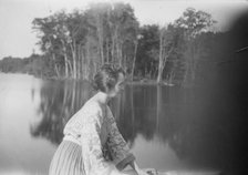 Mower, Margaret, Miss, seated outdoors, not before 1916. Creator: Arnold Genthe.