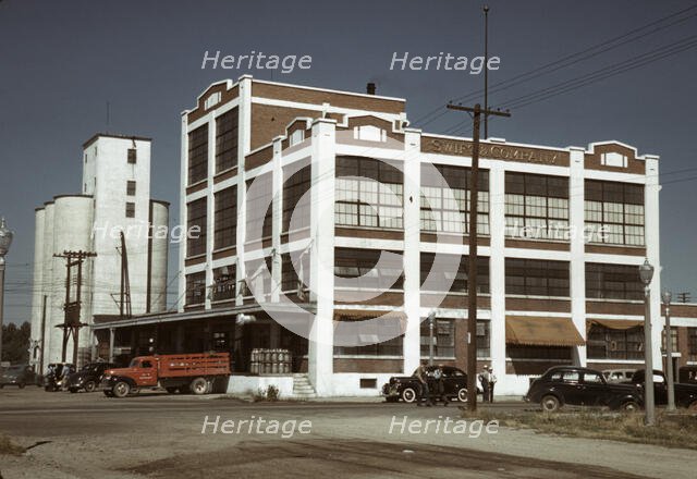 Milk and butter fat receiving depot and creamery, Caldwell, Idaho, 1941. Creator: Russell Lee.