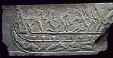 Egyptian relief of fishing from a boat with a net. Artist: Unknown