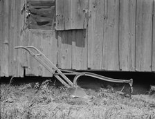 Sharecropper's cabin and sharecropper's tool, Mississippi, 1937. Creator: Dorothea Lange.