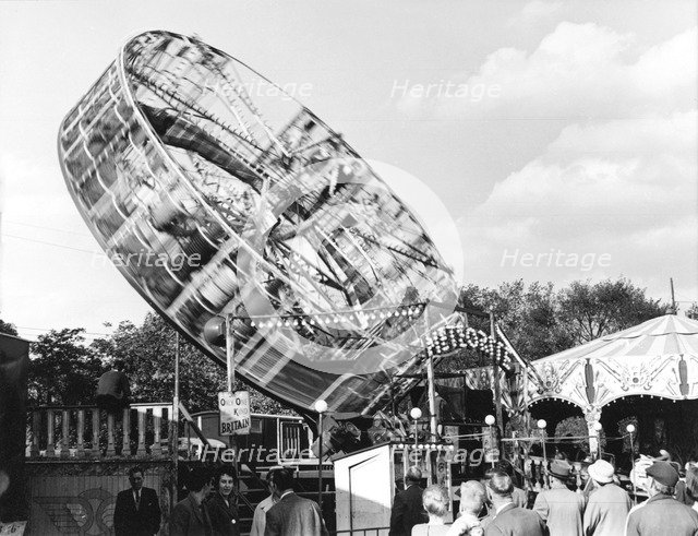 'Meteorite' ride, Goose Fair, Forest Recreation Ground, Nottingham, Nottinghamshire, 1961. Artist: George L Roberts