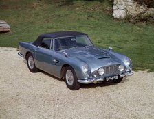 A 1964 Aston Martin DB5 sportscar. Artist: Unknown