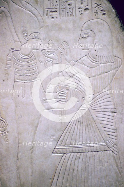 Egyptian relief of Amon making an offering to Osiris. Artist: Unknown