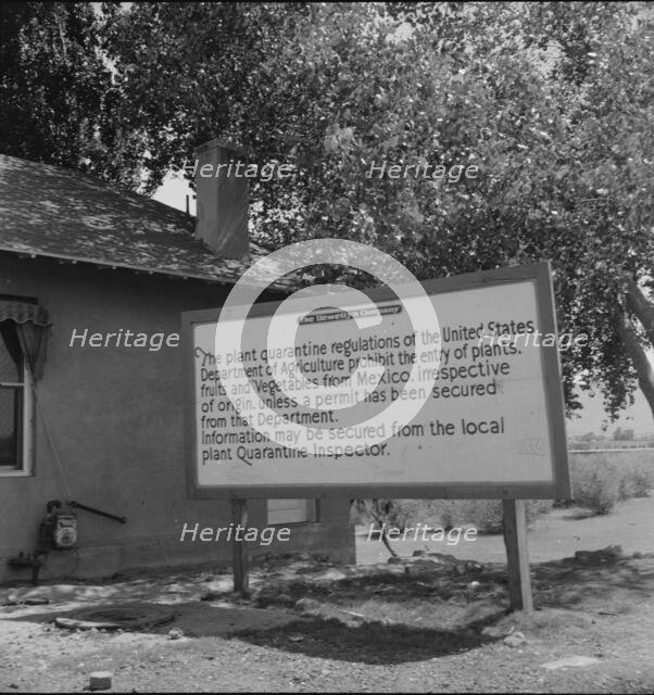 Sign at bridge between Juarez, Mexico and El Paso, Texas, 1937. Creator: Dorothea Lange.