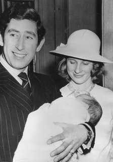The Prince of Wales holding his godchild, Alexander Windsor, Earl of Ulster, February 1975.  Creator: Unknown.