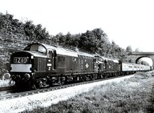 English Express train pulled by two diesel locomotives, travelling at 160 kilometers per hour bet…