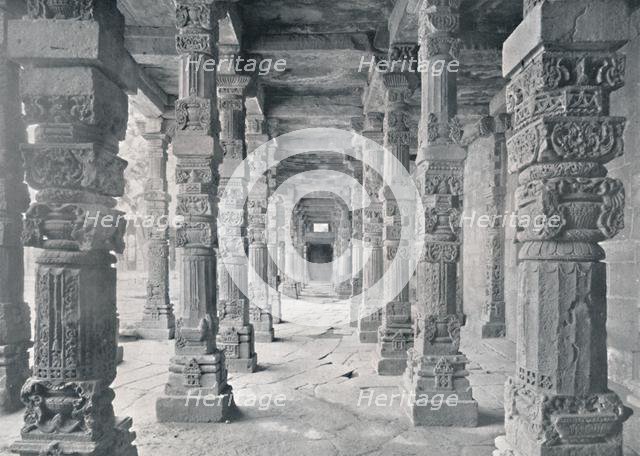 'Delhi. Corridor of Hindu Pillars in Kutub Mosque', c1910. Creator: Unknown.