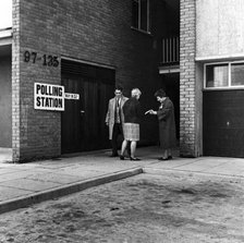 People walking into a polling station, London, 1964. Artist: Henry Grant