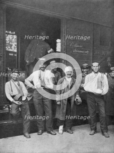 Wounded French soldiers on the way to hospital by train France, 1914. Artist: Unknown