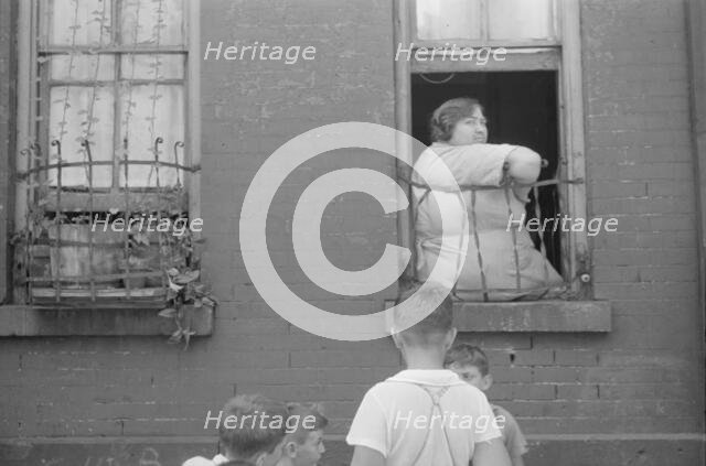 Children playing in the street, 61st Street between 1st and 3rd Avenues, New York, 1938. Creator: Walker Evans.